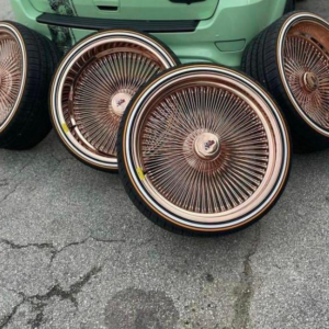 22x8 dayton 150 spoke wire wheels — rose gold staggered