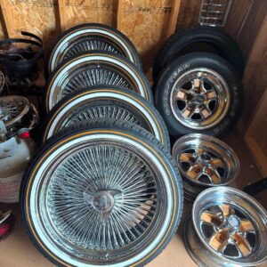 used 20 inch chrome spoke wheels with almost new Vogue tires knockoffs adapters 1994 Cadillac Fleetwood RWD