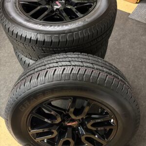 Used OEM GMC Sierra AT4 20 inch black gloss wheel with General Grabber tire